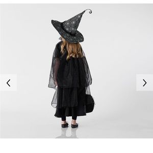 Pottery barn kids glow in the dark witch costume.
